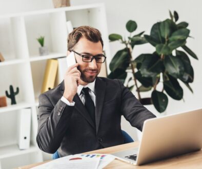 A businessman working on SaaS integration in his office.